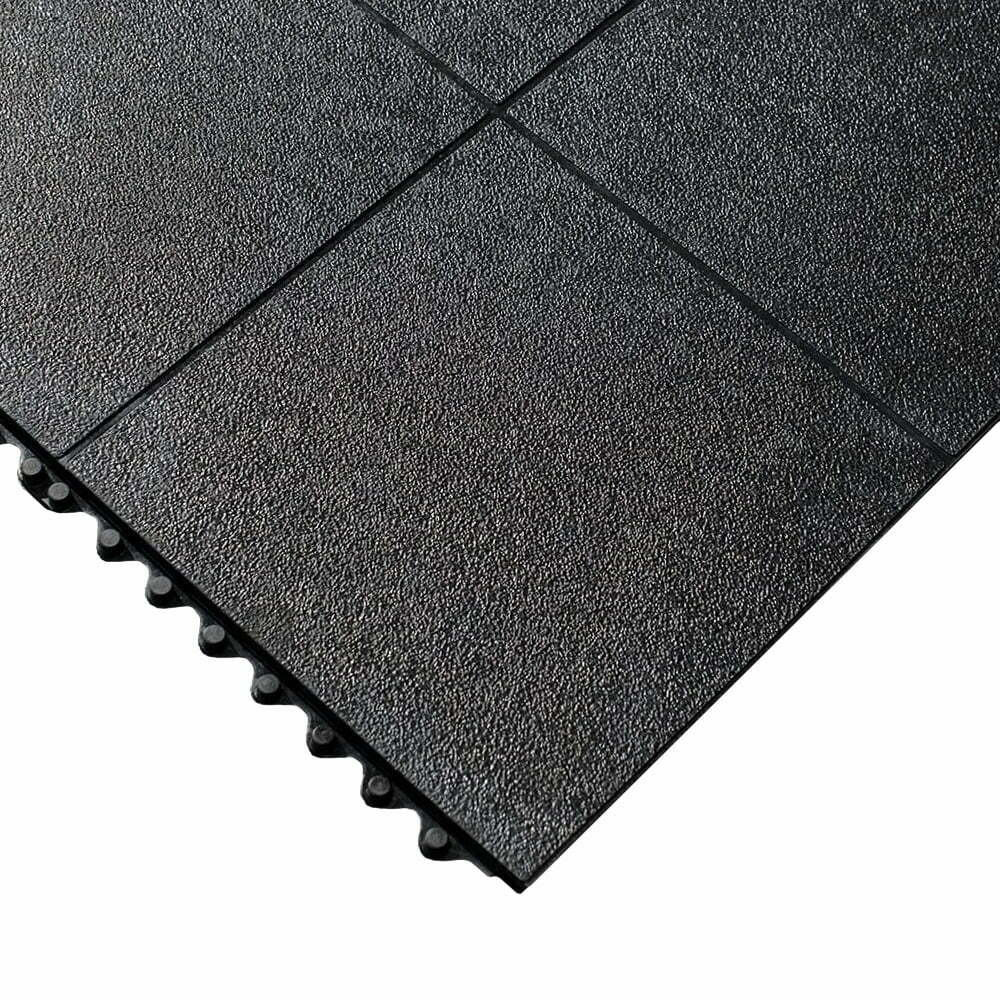 Close-up of 17mm interlocking rubber tile showing the textured anti-slip solid top and interlocking edge