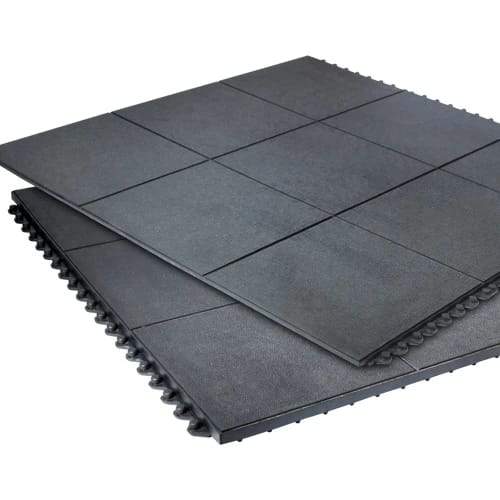 Two black 914mm interlocking rubber playground tiles showing solid top and interlocking edges